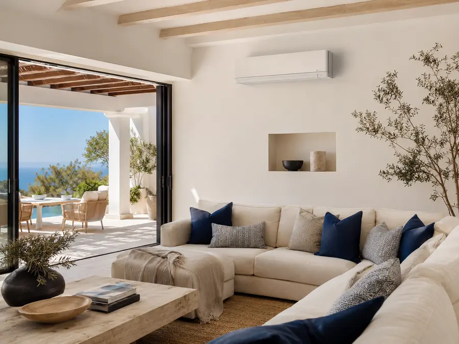Indoor air conditioning unit in a bright living room